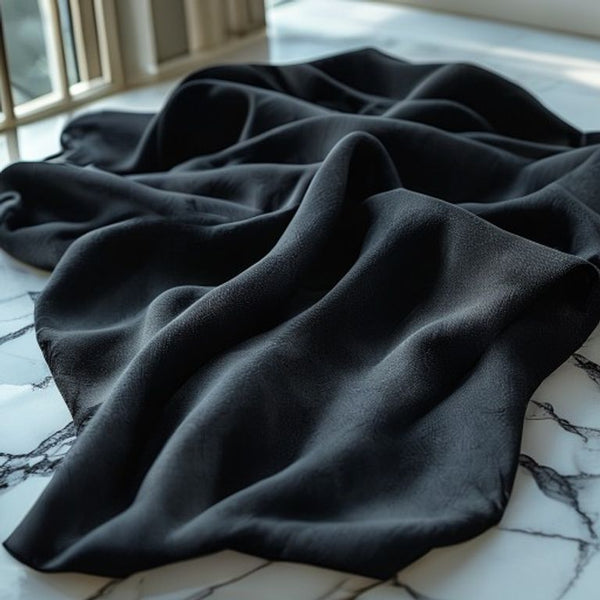 Luxury Fabric in deep black · Ridh Fabric Studio